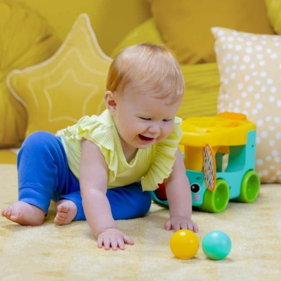 Pull-along toy Bright Starts Pop & Roll Safari Bus